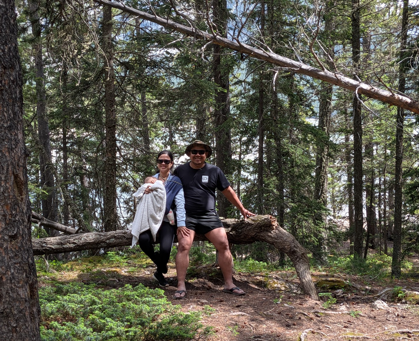 Jeremiah and his family on a forest trail